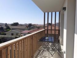 Galice : Apt neuf, deux chambres, balcon et parking